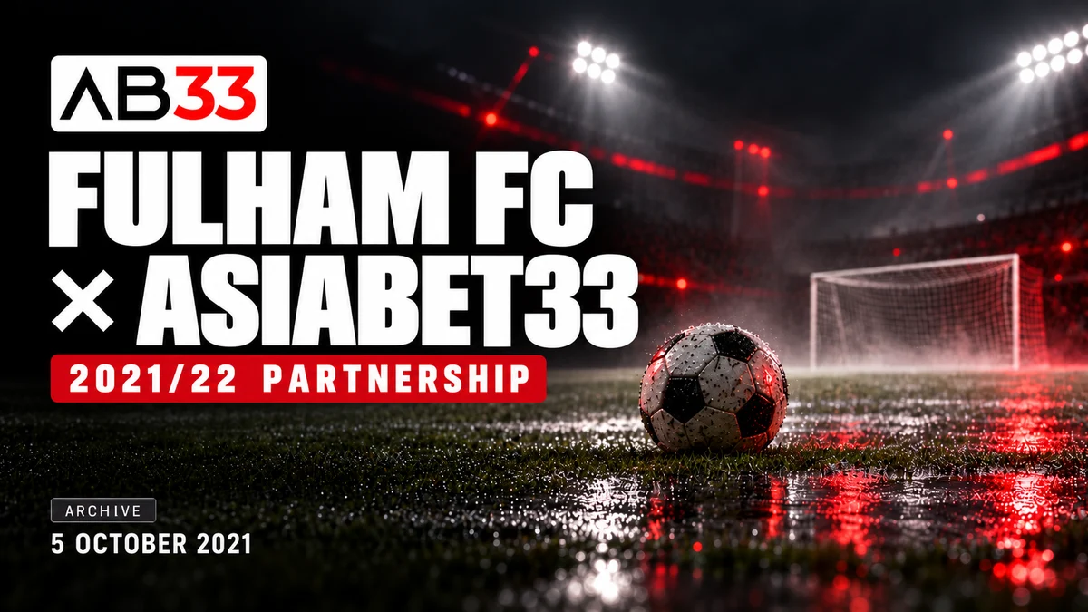 AB33 editorial cover for Fulham FC and Asiabet33’s 2021/22 partnership, announced 5 October 2021, over an illustrated floodlit football pitch.